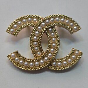 CC brooch